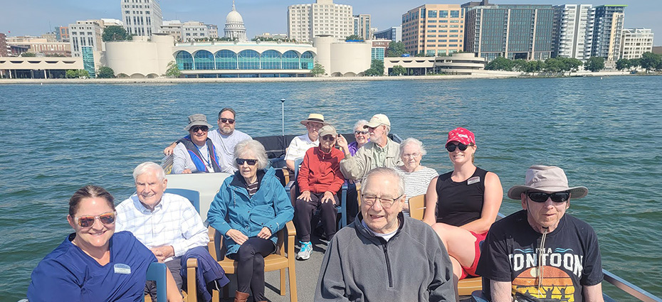 Memory Care folks take a pontoon boat ride on Lake Monona.